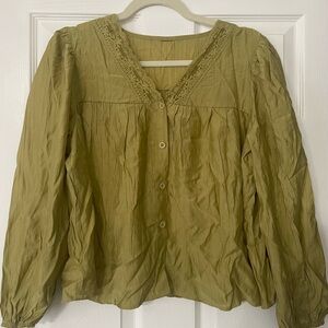 Women’s olive green lace lantern sleeve blouse.